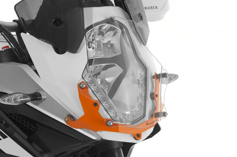 Scheinwerferschutz Makrolon mit Schnellverschluss, Halter orange, für KTM 1050 Adventure/ 1090 Adventure/ 1190 Adventure/ 1190 Adventure R/ 1290 Super Adventure *OFFROAD USE ONLY*