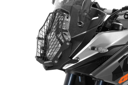 Scheinwerferschutz Edelstahl schwarz mit Schnellverschluss, Halter schwarz, für KTM 1050 Adventure/ 1090 Adventure/ 1190 Adventure/ 1190 Adventure R/ 1290 Super Adventure *OFFROAD USE ONLY*