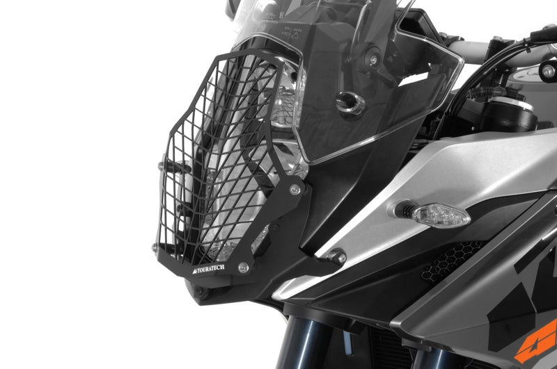Scheinwerferschutz Edelstahl schwarz mit Schnellverschluss, Halter schwarz, für KTM 1050 Adventure/ 1090 Adventure/ 1190 Adventure/ 1190 Adventure R/ 1290 Super Adventure *OFFROAD USE ONLY*