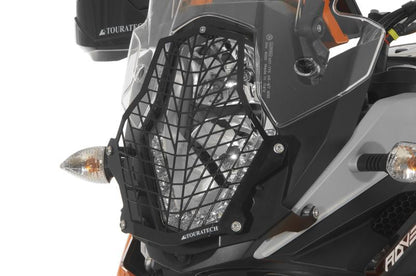 Scheinwerferschutz Edelstahl schwarz mit Schnellverschluss, Halter schwarz, für KTM 1050 Adventure/ 1090 Adventure/ 1190 Adventure/ 1190 Adventure R/ 1290 Super Adventure *OFFROAD USE ONLY*